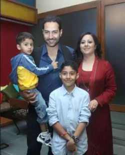 Sudhanshu Pandey with his wife and children compressed